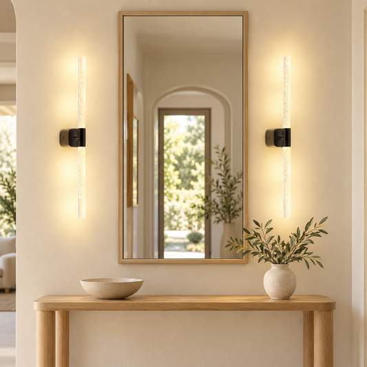 Orion black rechargeable wall sconces framing an entryway mirror