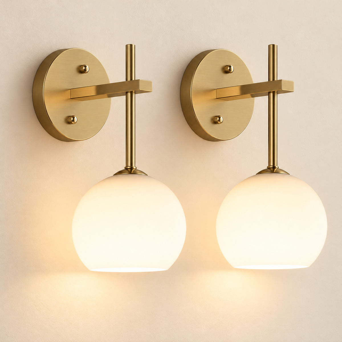 Lucia rechargeable wall sconces in gold with frosted glass, set of two, studio image
