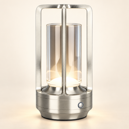 Lumi rechargeable touch table lamp in silver on an ivory studio background