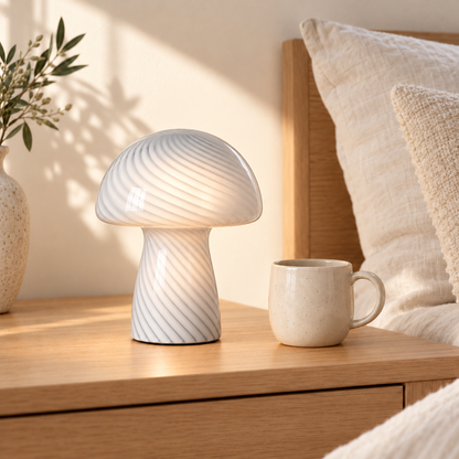Margot Grey & White mushroom lamp on a bedside table beside a mug