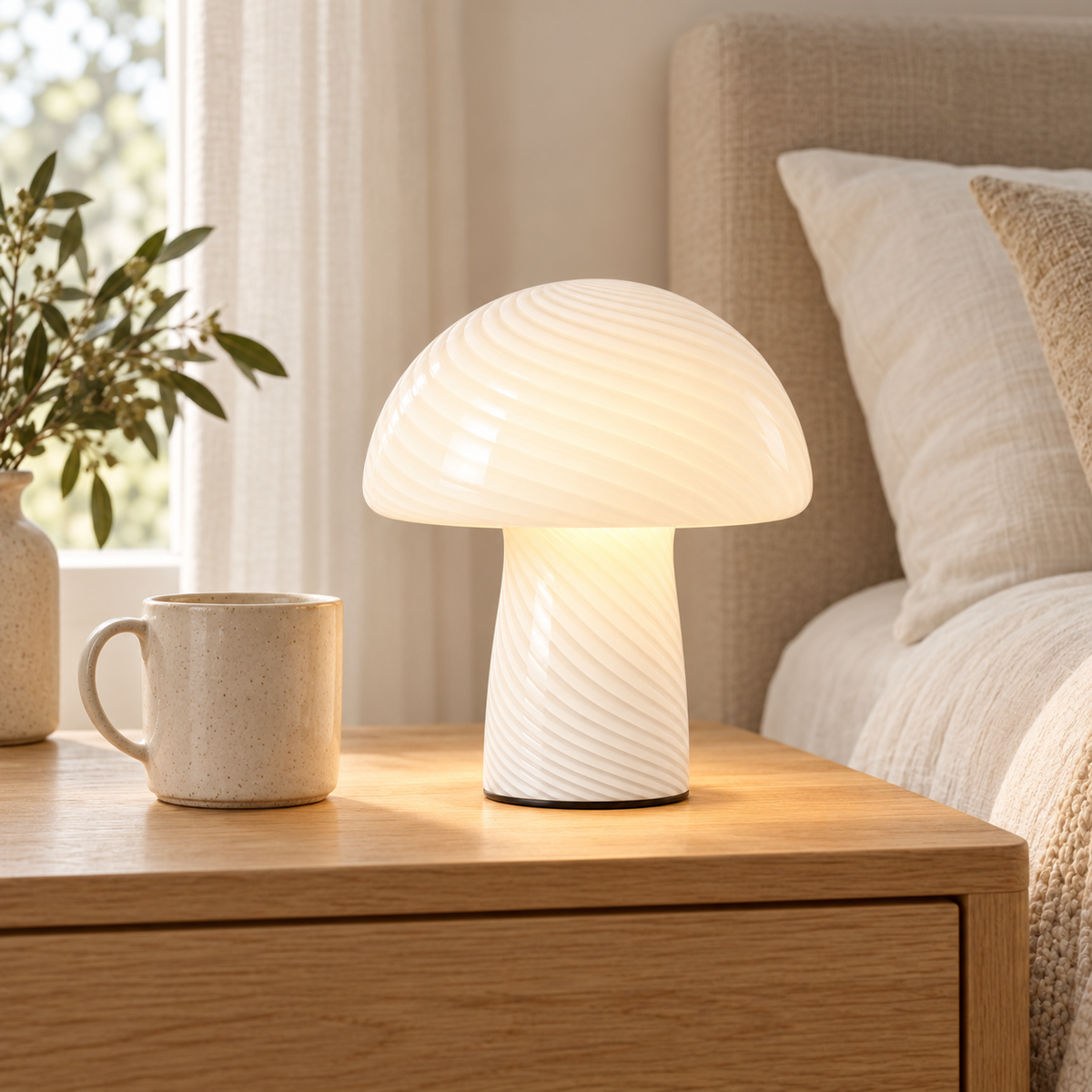 Margot White lamp on a bedside table