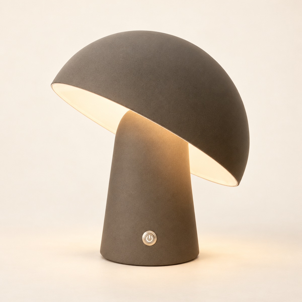 Arlo steel-grey rechargeable mushroom table lamp with an angled shade and warm glow on an ivory background