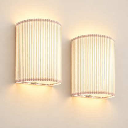 Aura rechargeable RGB wall sconces, set of two, on a warm ivory background