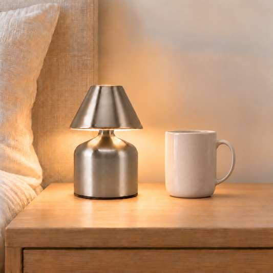Elara 15 cm silver touch table lamp beside a 9 cm ivory mug