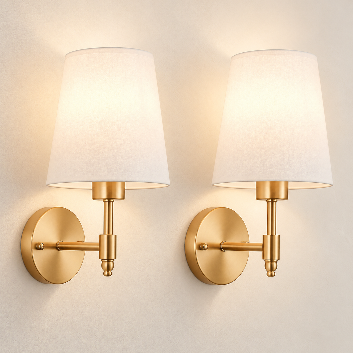Juliette Rechargeable Wall Sconces in gold and white, set of two, on a warm ivory background