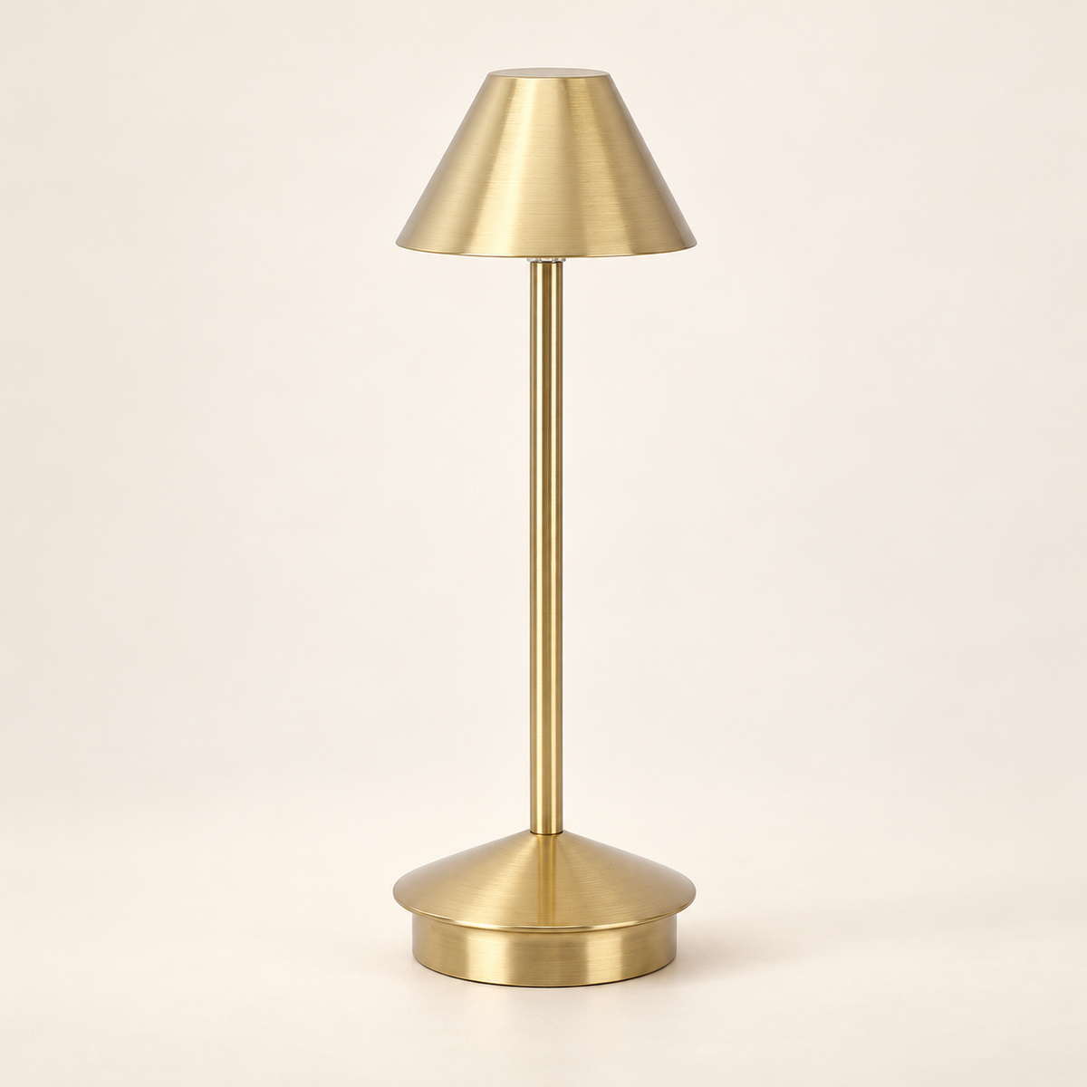 Siena rechargeable touch table lamp in brushed gold on a warm ivory background