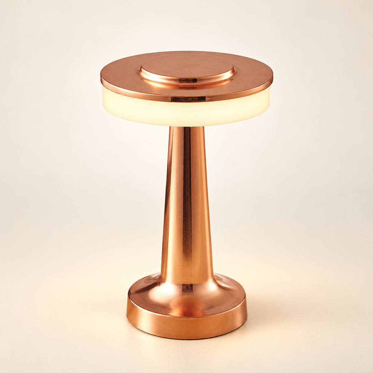 Solène bronze rechargeable mushroom table lamp with a circular diffuser on a warm ivory background