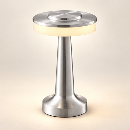 Solène silver rechargeable mushroom table lamp with a circular diffuser on a warm ivory background